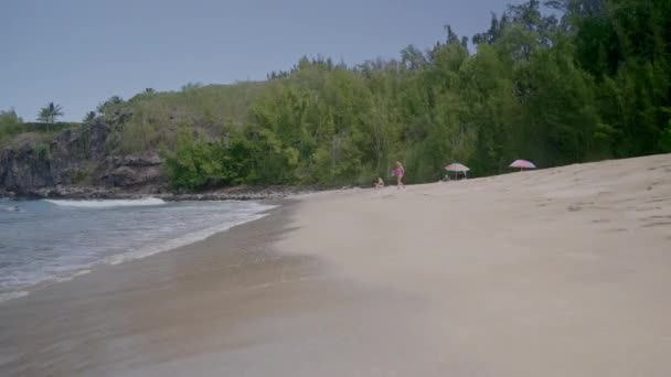 Woman Walks Ocean While Vacation — Vídeo de stock