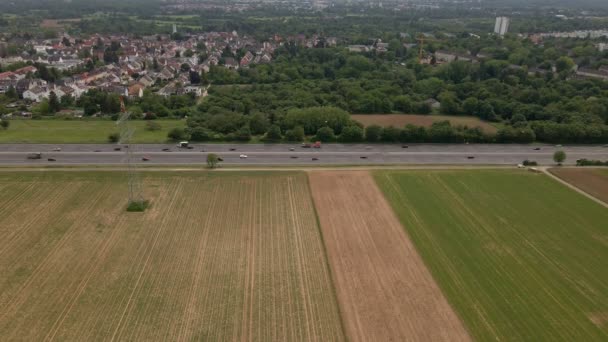 Static Aerial Time Lapse Numerous Cars Driving Freeway Fields Village — Vídeos de Stock