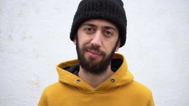 Caucasian Man His 20S Wearing Black Beanie Hat Yellow Jacket — Vídeos de Stock