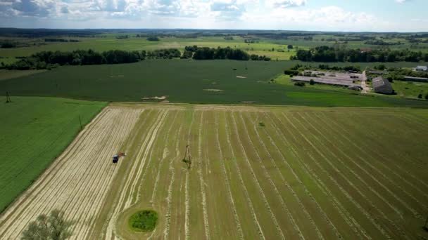 Agriculture Tractor Working Vast Countryside Farmland Aerial Drone Shot — Stockvideo