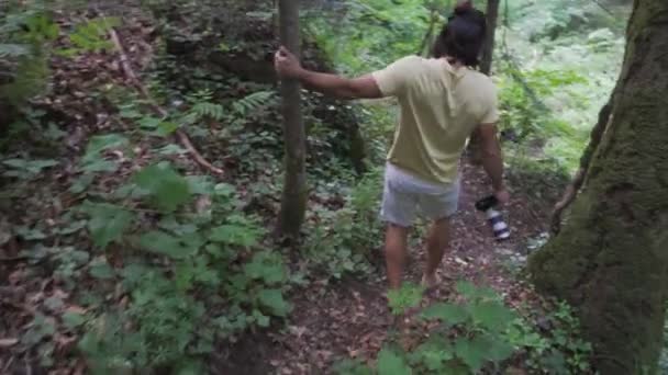 Young Man Walks Hill Forrest Beautiful Wild Waterfall Taking Pictures — Vídeo de stock