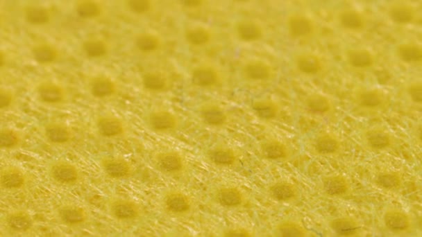 Yellow Textile Cloth Surface Texture Macro Shot Close View Rotation — Vídeo de stock