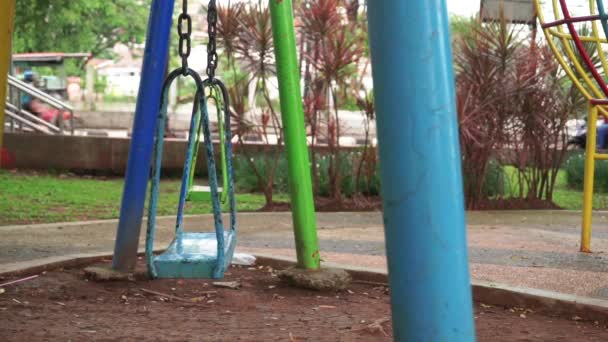 Close Shot Wind Moving Colorful Swing Children Park Background Very — Vídeos de Stock