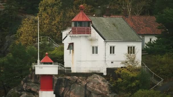 Lighthouse Rocky Coast Kristiansand Slow Motion Pan Follow — Stockvideo