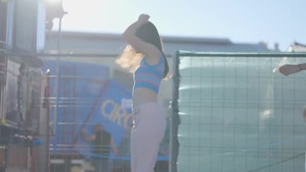 Young Dark Haired Women Spin Roller Skates Sunlight — Stockvideo