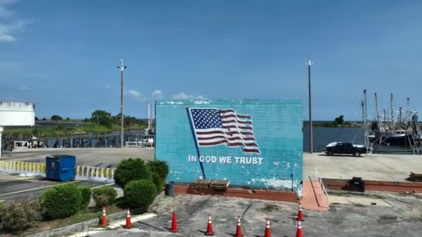 God Trust Written Fishery Wall Pensacola Florida — Stockvideo
