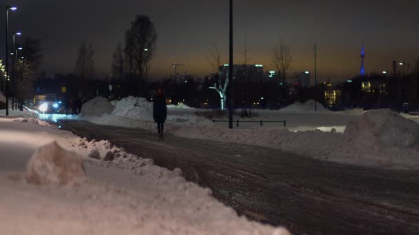 Young Woman Walks Icy City Street Dark Winter Pre Dawn — Stock Video