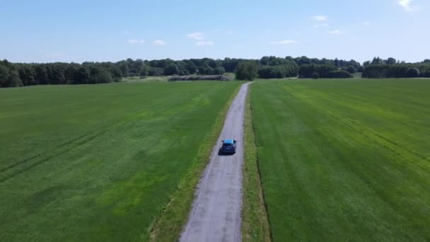 Video Driving Blue Hybrid Car Green Field — Video Stock