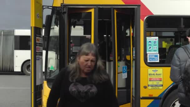 Busy Bus Interchange Bus Stop Passengers Boarding Alighting Day — Stockvideo