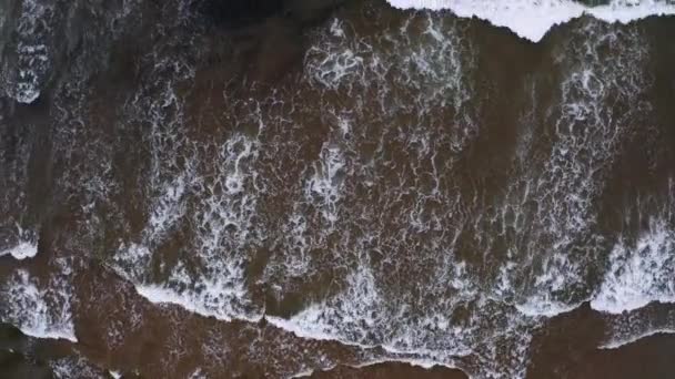Aerial Top View Waves Whitecaps Approaching Beach Windy Day — Video