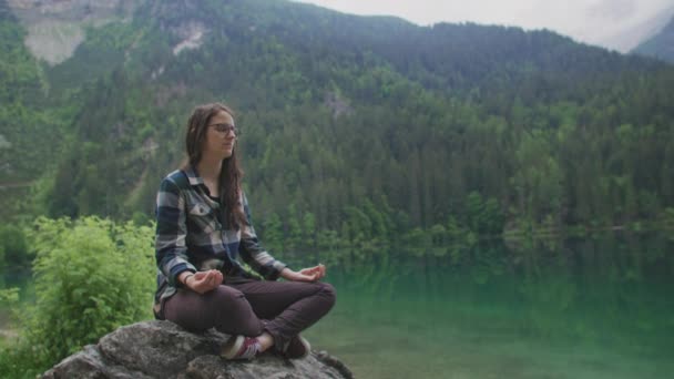 Wide Shot Woman Doing Yoga Meditation Rock Surrounded Nature Mountain — Video