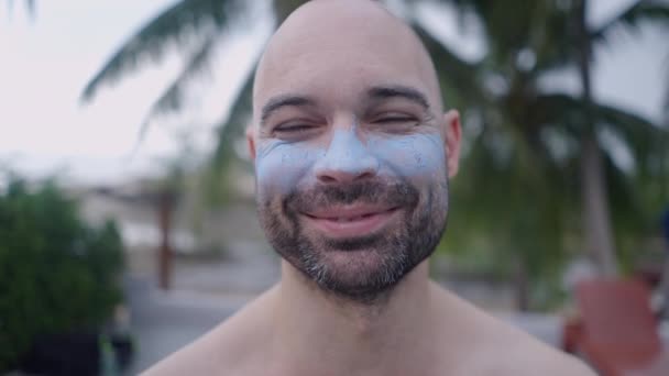 Happy Caucasian Bold Bearded Man Blue Paint Face Showing Toothy — Vídeo de stock