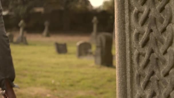 Woman Walks Graveyard — Vídeo de Stock