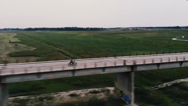 Drone Shot Motorcycle Driving Bridge — Video Stock