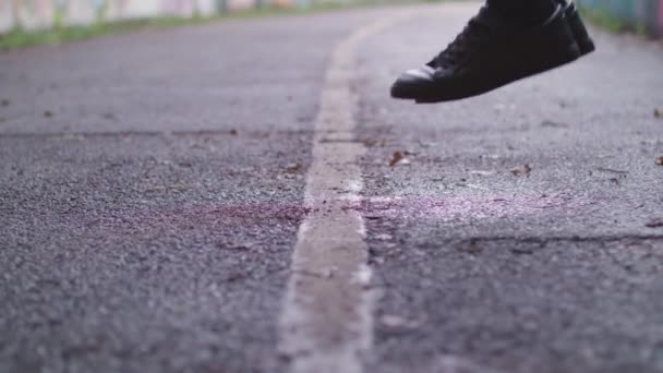 Close Shot Young Athletic Man Shoes Whilst Jumping Rope Skipping — Stockvideo