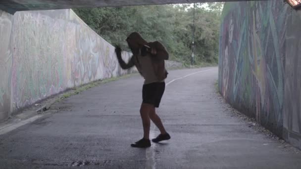Young Active Man Boxing Underpass Silhouetted Light — Vídeos de Stock