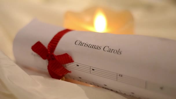 Folha Música Natal Carol Com Velas — Vídeo de Stock