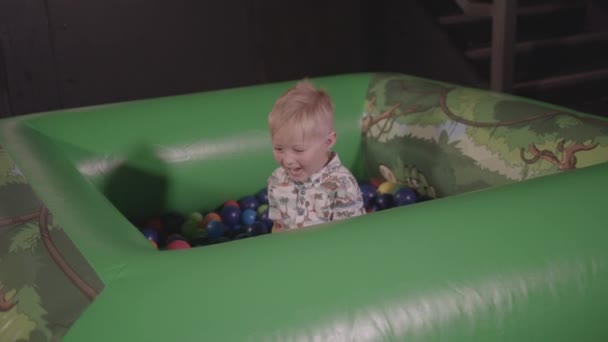 Young Happy Boy Playing Ball Pit Ungraded — Stock Video