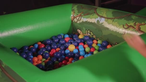 Young Boy Diving Ball Pit Laughing Afterwards — Stockvideo