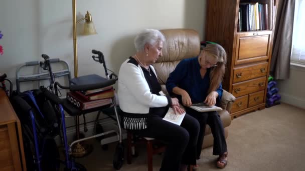 Wide Shot Mature Woman Elderly Woman Looking Photo Album — Stok video