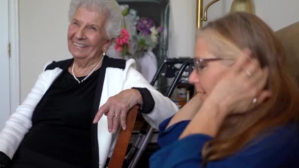 Blonde Mature Woman Talks Elderly Woman Smiles Looks Her — Vídeo de Stock