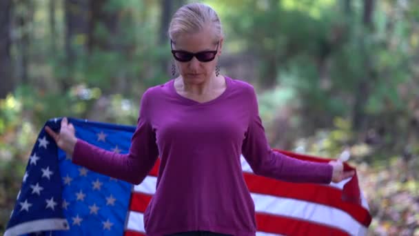 Blonde Woman Raising American Flag Her Serious Expression — Wideo stockowe