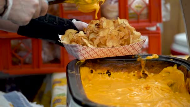Slow Motion Putting Cheese Sauce Serving Tornado Curly Potato Fries — Vídeos de Stock