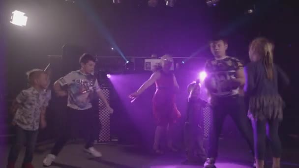 Young Children Dancing Happily Disco Party Bright Lights Ungraded — Vídeo de stock