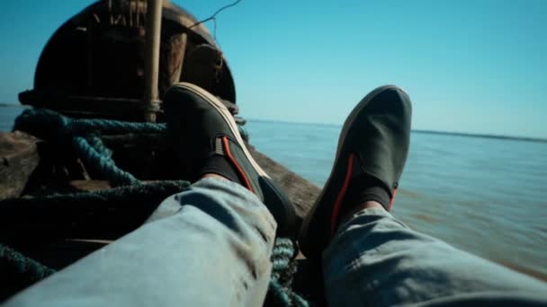 Pair Shoes Shot Bow Boat Slow Motion Moving Forward River — Stockvideo