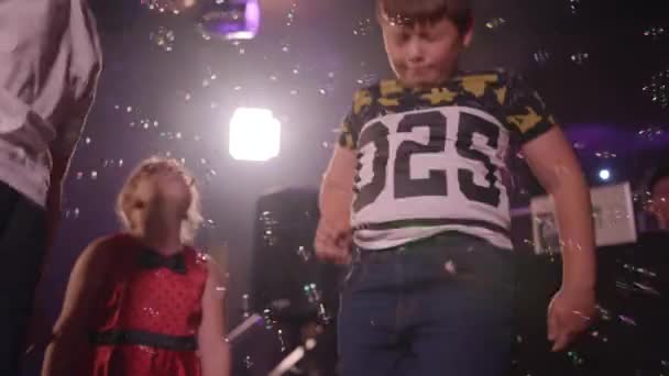 Kids Dancing Bouncing Bubbles Floating Slow Motion — Vídeo de Stock