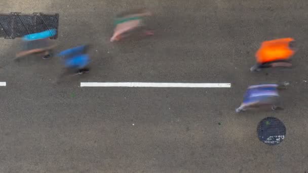 Aerial Time Lapse View Marathon Runners Running Tarmacked Street — 비디오