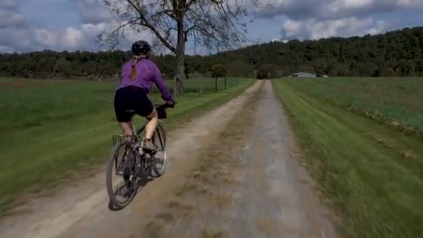 Woman Pony Tail Helmet Mountain Bike Going Fast Gravel Track — 图库视频影像