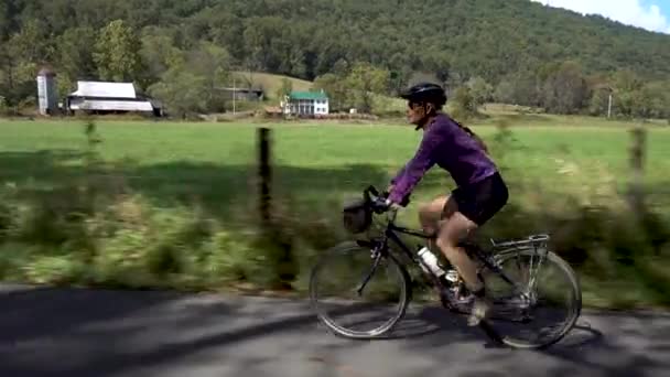 Side Shot Mature Woman Biking Her Son Shady Rural Road — 图库视频影像