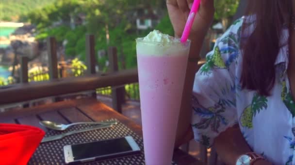 Asian Girl Drinking Milk Shake Relaxing Restarurant Sea View — Stockvideo