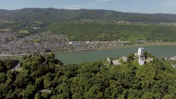 Drone Flies Parallel River Revealing Two Castles Mountains — Stockvideo