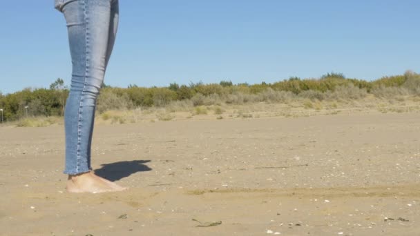 Medium Shot Woman Kicking Sand Beach — Video