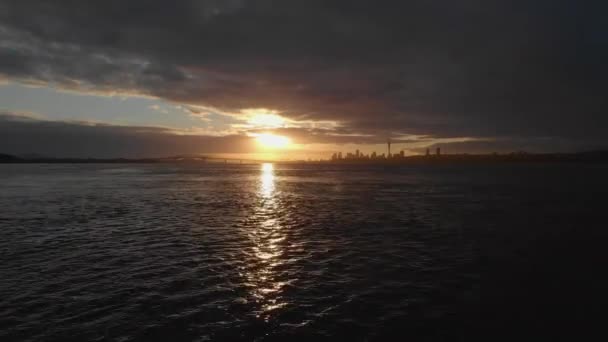 Aerial Flying Low Rising Auckland Harbour Golden Sunrise Cityscape — Video Stock