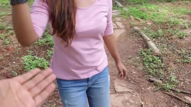 Pov Shot Couple Holding Hands Walking Together — Stockvideo