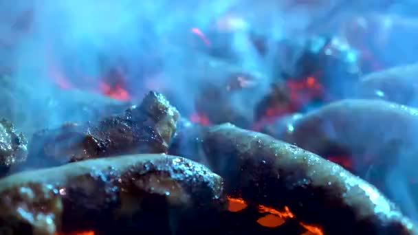 Low Angle Shot Closeup Sausages Grilling Fiery Hot Grill Smoke — Vídeos de Stock
