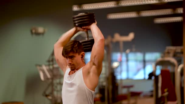 Closeup Handsome Teen Bodybuilder Doing Overhead Tricep Press Extensions — Stockvideo