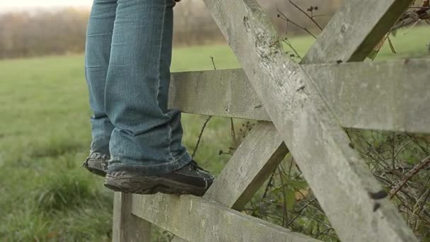 Muddy Boots Countryside Gate — Stock video