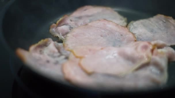 Ham Slices Cooking Black Pan Steam — стоковое видео