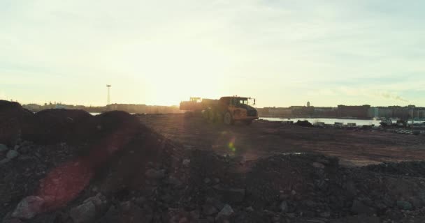 Static Aerial Shot Excavator Digging Loading Dirt Truck Sunset — Stockvideo