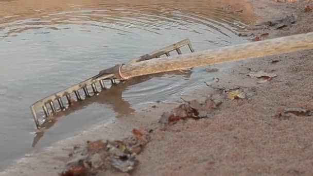 Raking Leaves Sand Bunker — Stockvideo