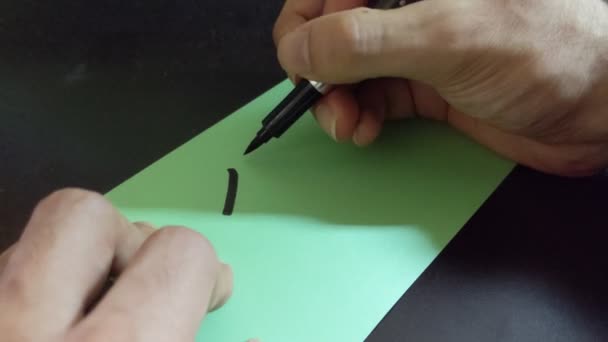 Closeup Chinese Japanese Calligraphy Drawing Character Gold Metal — Vídeos de Stock