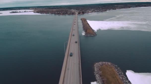 Aerial Shot Cars Driving Icy Water Huge Highway Bridge Surrounded — Video