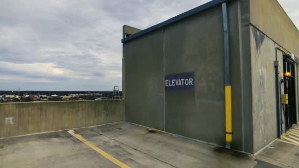 Parking Garage Elevator Exterior Downtown Skyline View — Stockvideo