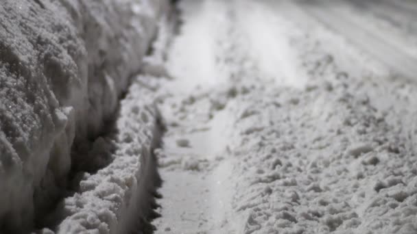 Still Shot Snow Covered Road Tire Tracks Going — Vídeo de Stock