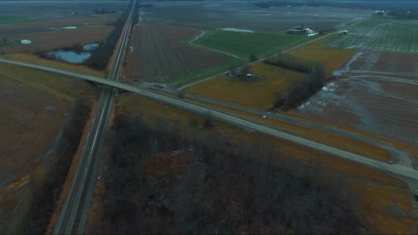 Cars Trucks Bus Traveling Overpass Running Railroad Tracks Next Pond — Stockvideo