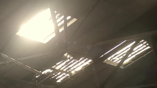 Sun Shines Rafter Roof Windows Derelict Building — Stockvideo